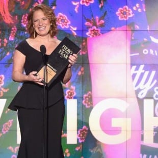 Amy Wright accepting an award.