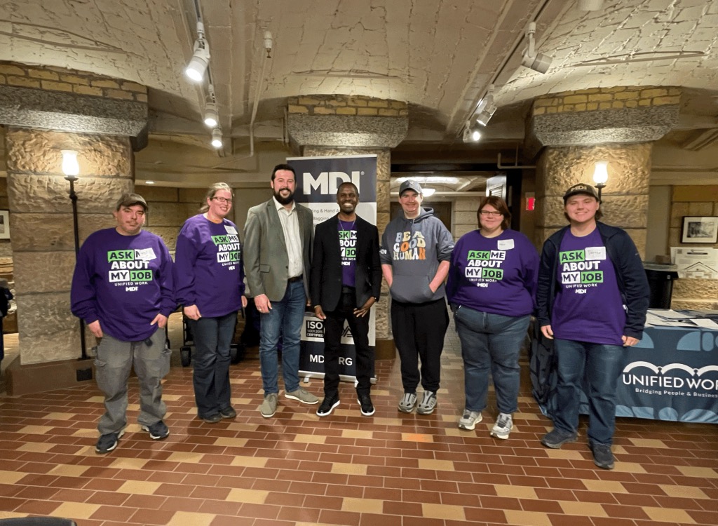 Representative Spencer Igo and Eric Black stand with MDI Employees