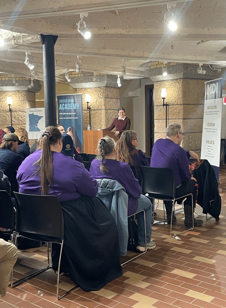 Ellen Larson with Goff Public speaks with MDI employees