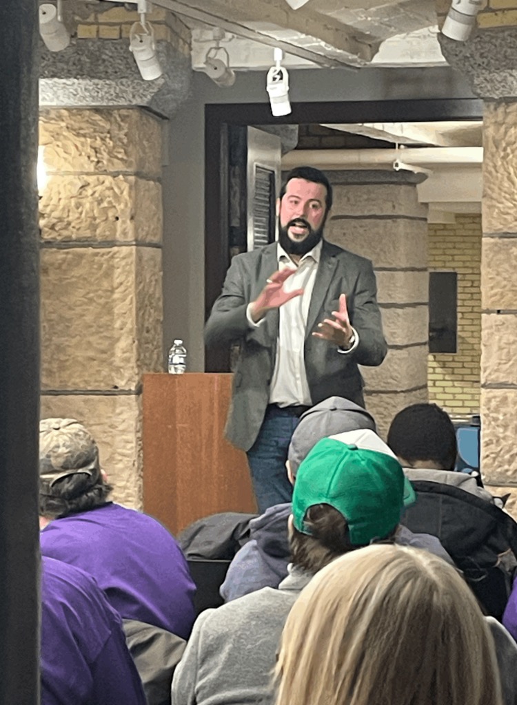 Representative Spencer Igo speaks with MDI employees
