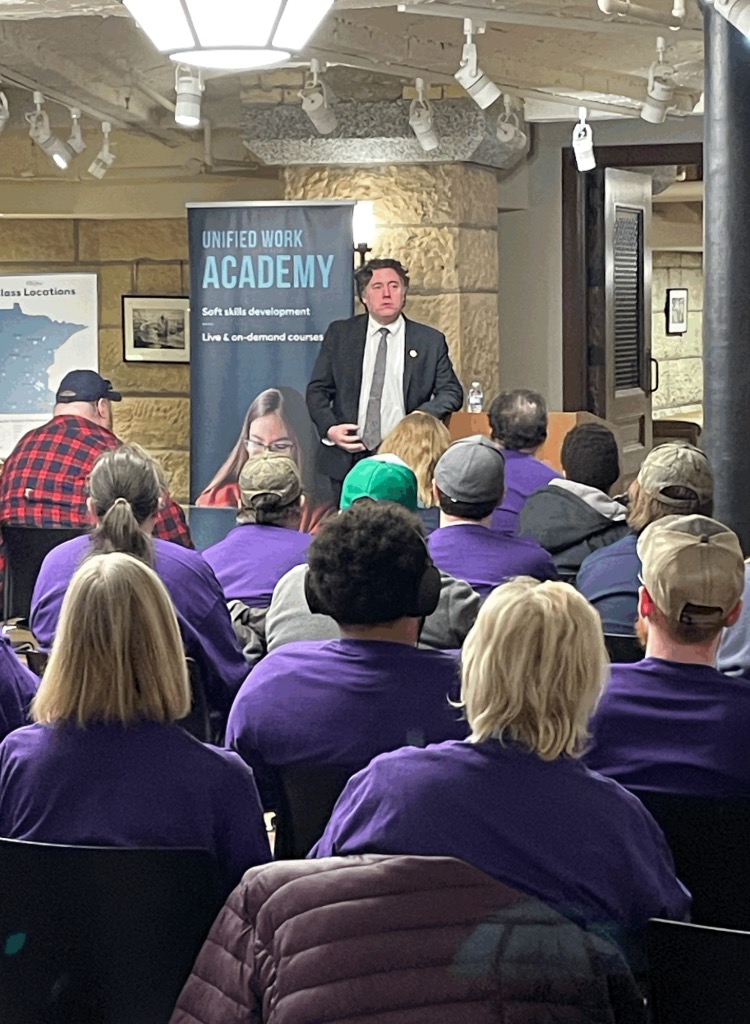 Senator Aric Putnam speaks with MDI employees at Minnesota State Capital